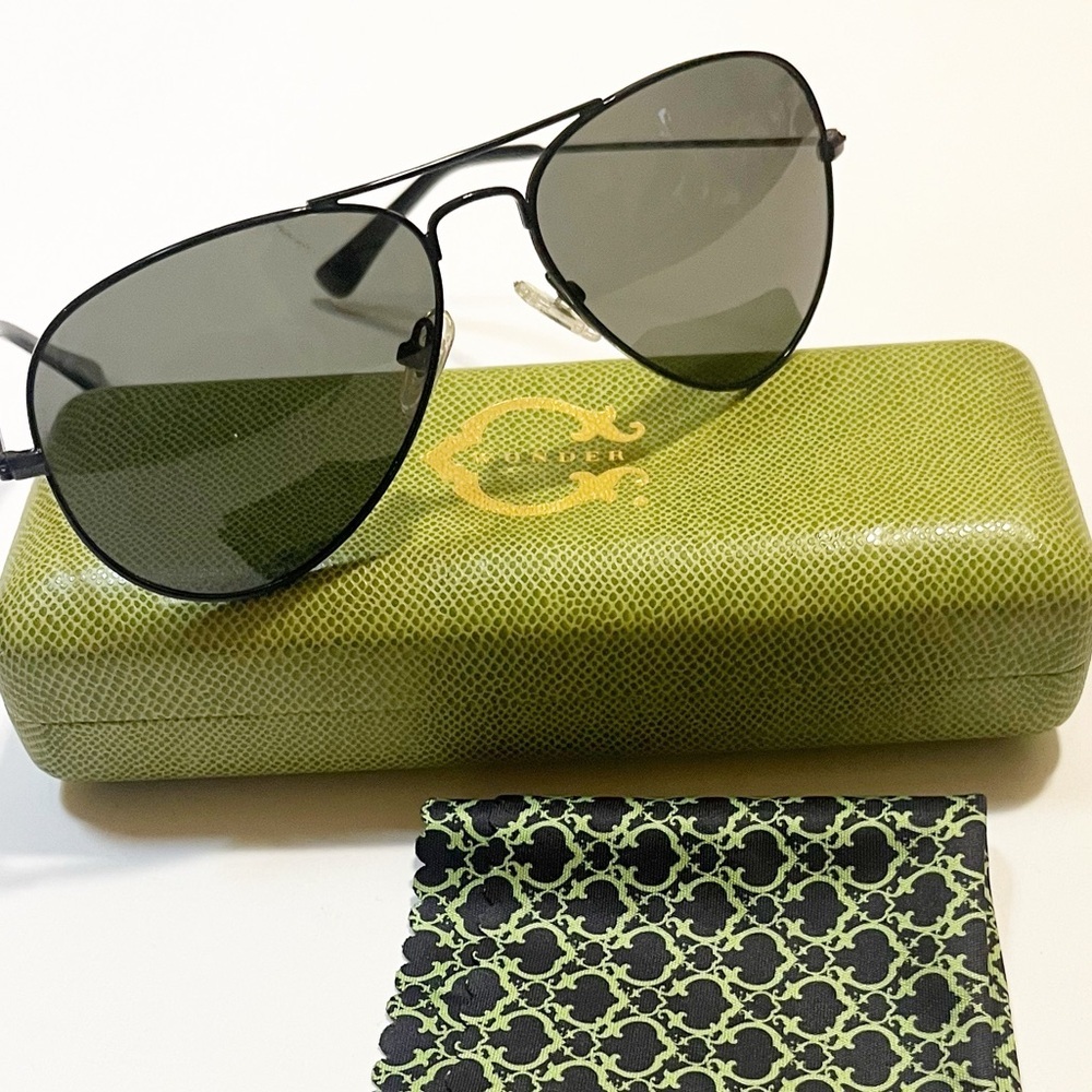 C. Wonder black Aviator Sunglasses, Reptile Eyeglass Case, and cleaning cloth.
